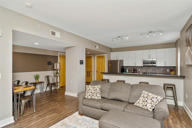 living room with light hardwood / wood-style floors