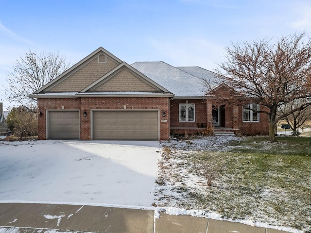 view of front of property with a garage