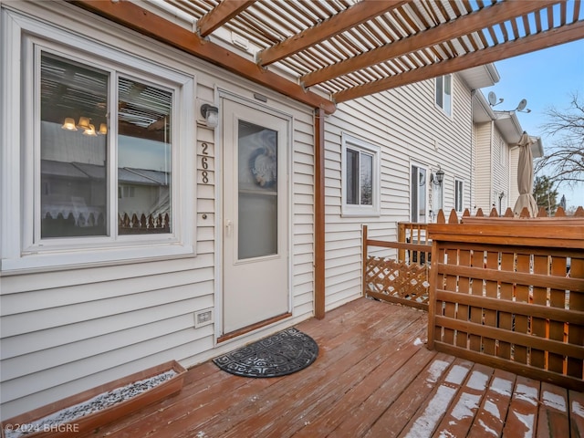 wooden deck with a pergola