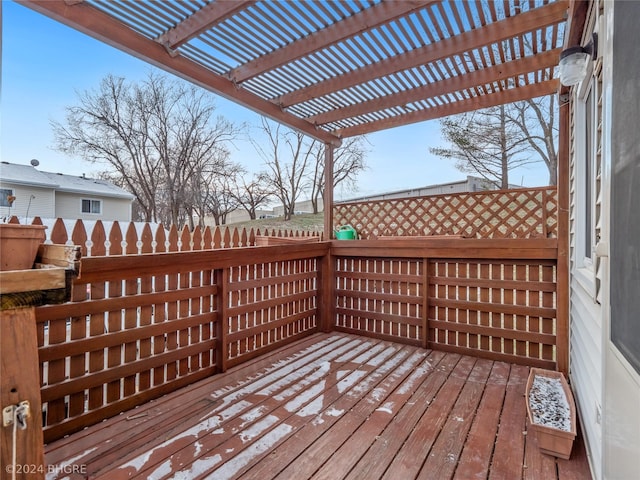 wooden deck featuring a pergola