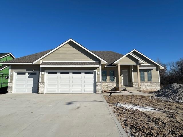 craftsman-style house featuring a garage