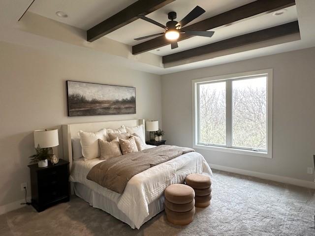 703 Richland Ct, Van Meter, IA 50261 - bedroom with carpet flooring, beamed ceiling, and baseboards