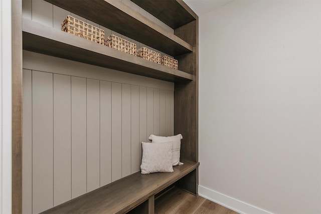 703 Richland Ct, Van Meter, IA 50261 - mudroom featuring wood finished floors and baseboards