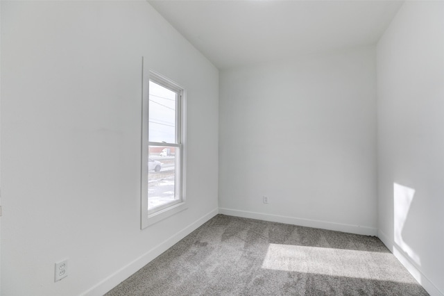 unfurnished room with carpet floors