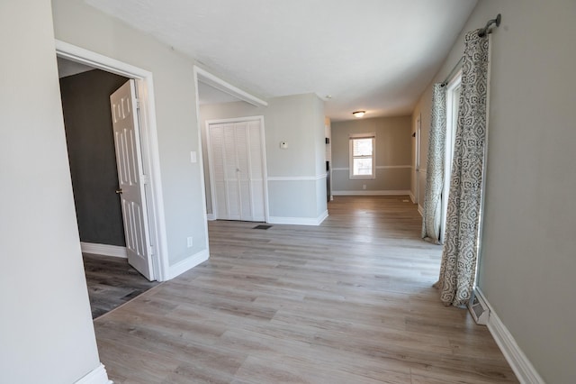 hallway featuring light wood-type flooring