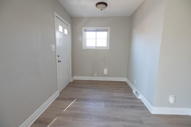 foyer entrance featuring light hardwood / wood-style flooring