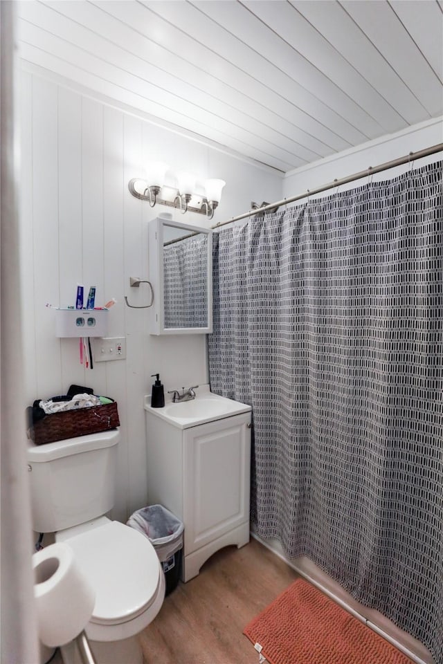 bathroom featuring a shower with curtain, sink, wooden ceiling, hardwood / wood-style floors, and toilet