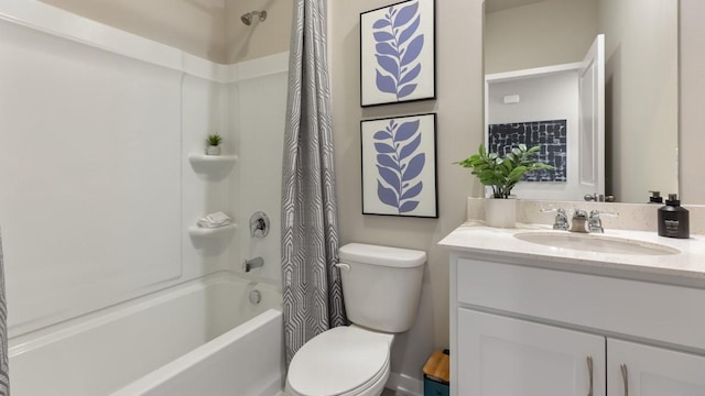 full bathroom with toilet, shower / tub combo, and vanity