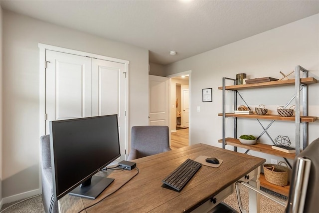 home office featuring baseboards