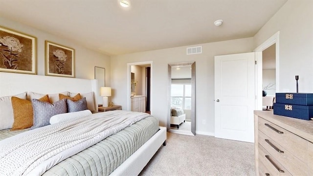 4772 172nd St, Urbandale, IA 50323 - bedroom featuring light colored carpet and ensuite bath