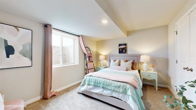 bedroom with light carpet