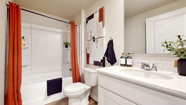 full bathroom with vanity, toilet, and shower / bathtub combination with curtain