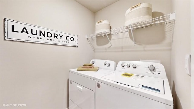 washroom with washer and clothes dryer