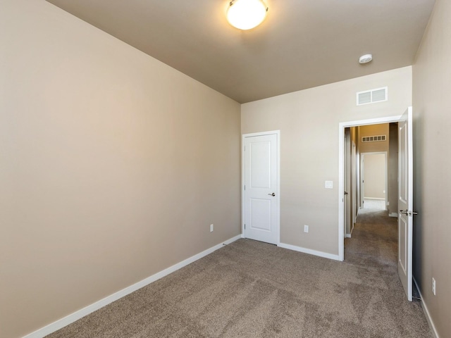 unfurnished bedroom with carpet