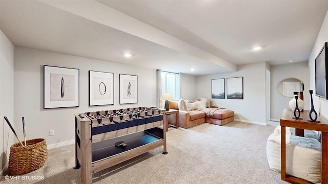 recreation room featuring light carpet