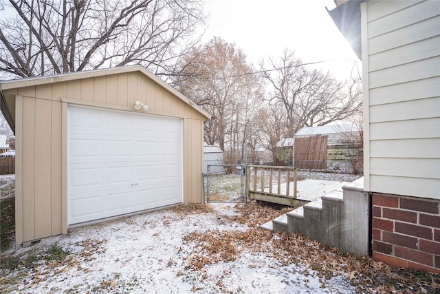 view of snow covered garage