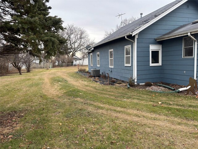 view of yard with central AC