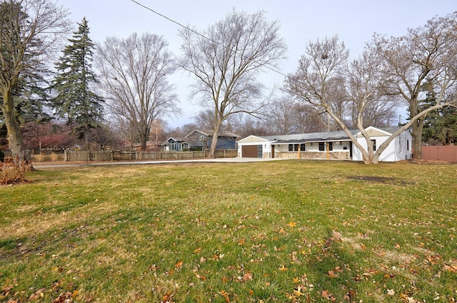 view of yard featuring a garage