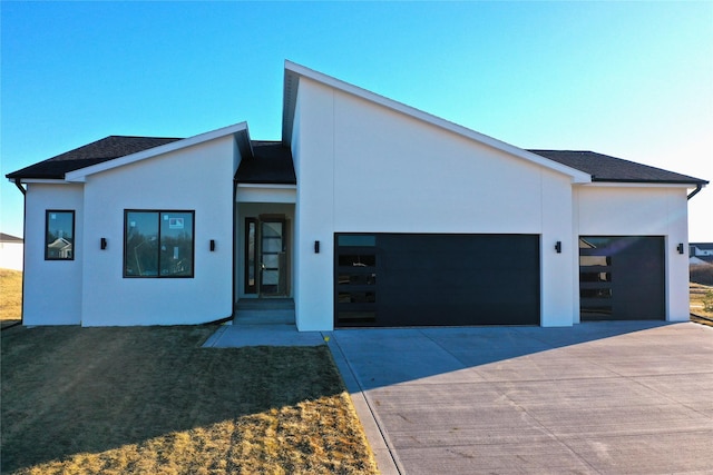 modern home featuring a garage