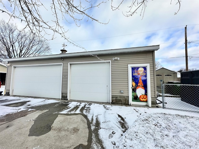 view of snow covered garage