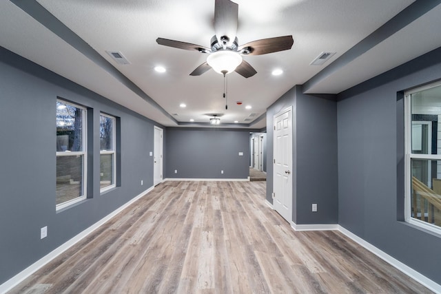 empty room featuring light hardwood / wood-style floors and ceiling fan