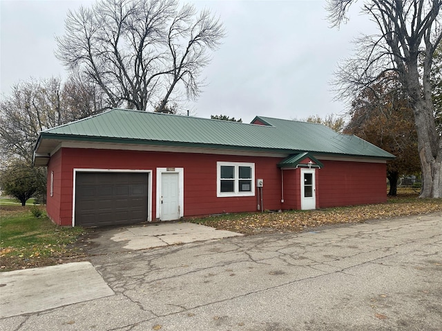 exterior space with a garage