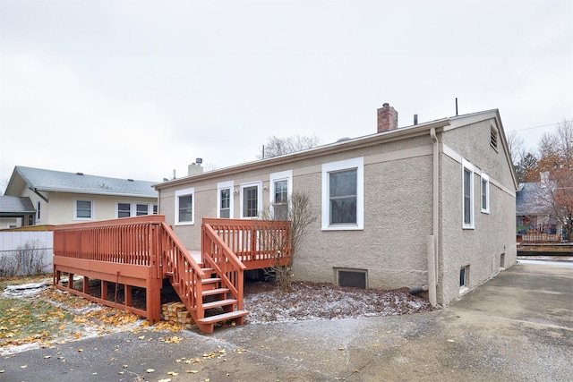 rear view of house with a deck