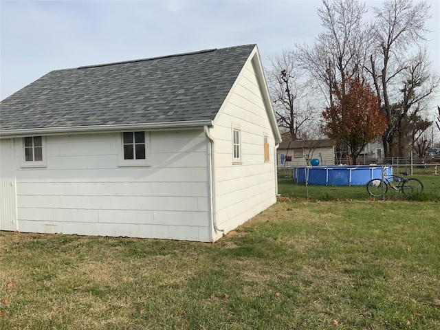 view of outdoor structure with a yard