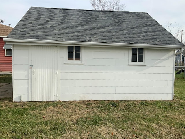 view of outdoor structure with a yard