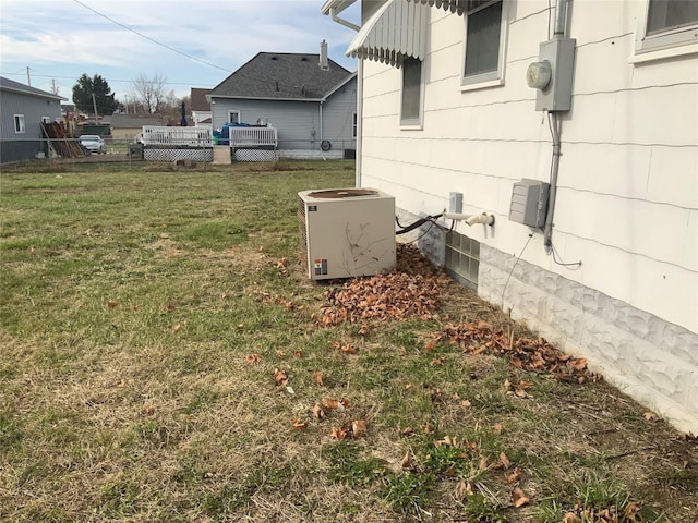 view of yard featuring central AC unit