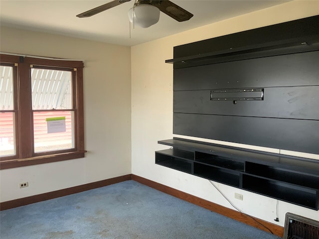 mudroom with ceiling fan and light colored carpet