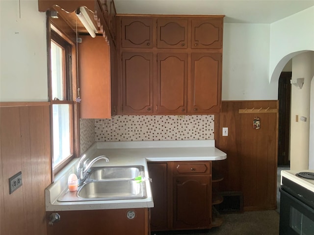 kitchen featuring white range with electric cooktop and sink