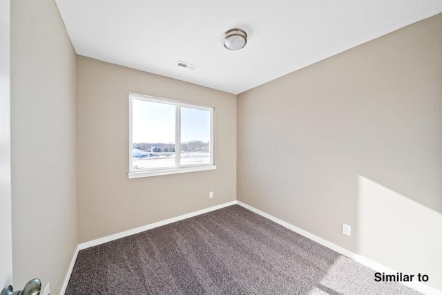 empty room featuring carpet floors