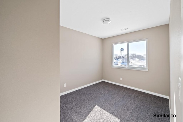 view of carpeted spare room