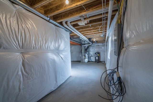 basement featuring electric water heater