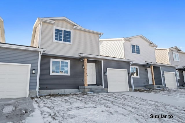 view of front of property with a garage