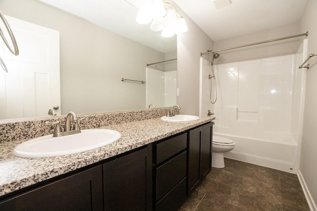 full bath featuring double vanity, toilet, shower / washtub combination, and a sink