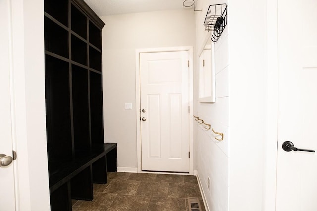 mudroom featuring baseboards and visible vents