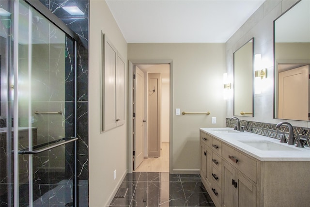 bathroom with vanity and an enclosed shower