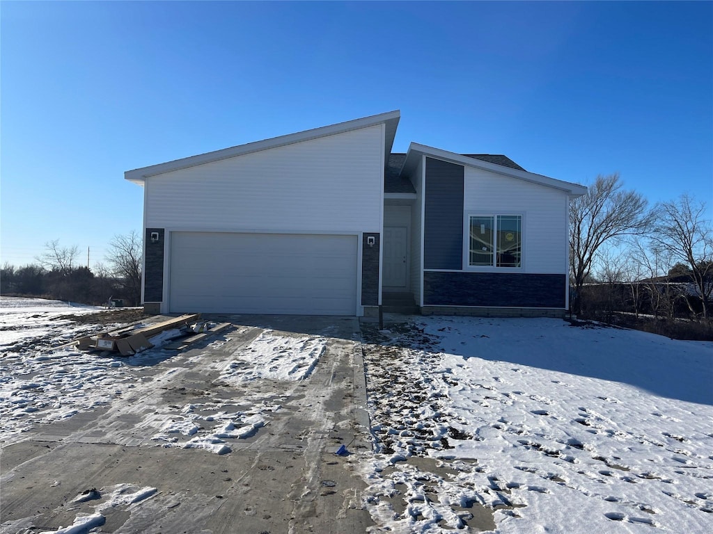 view of front of property with a garage