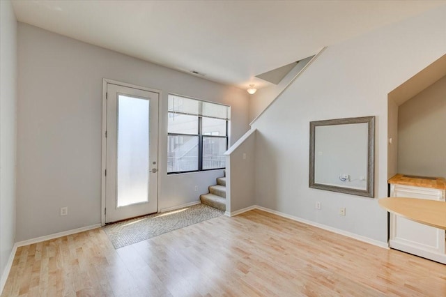 foyer with light wood-type flooring