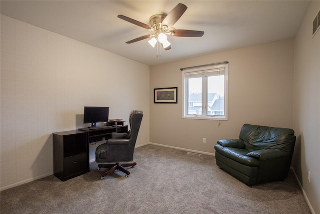 carpeted office with ceiling fan