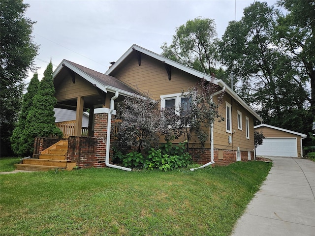 view of front of property with a front lawn, an outdoor structure, and a garage