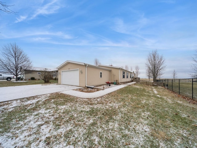 view of side of home featuring a garage