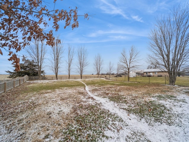 view of yard with a rural view