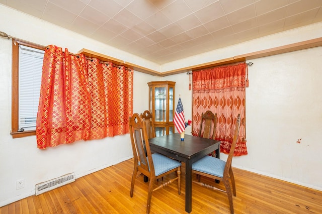 dining area featuring hardwood / wood-style flooring