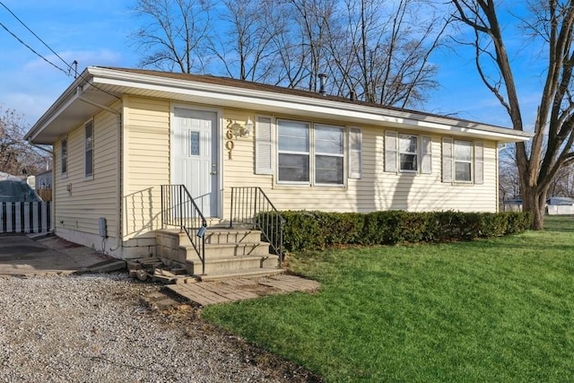 view of front of home with a front yard