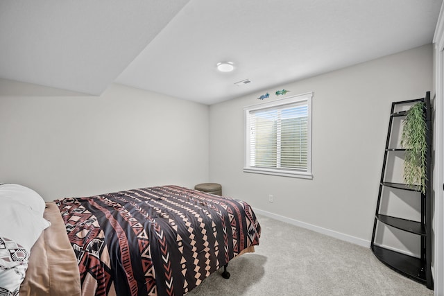 bedroom with light carpet