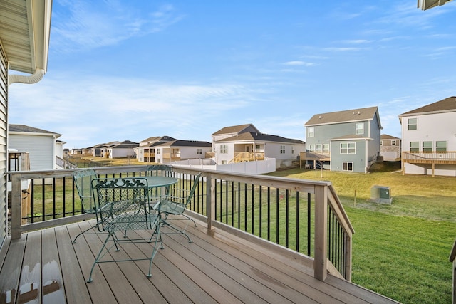 deck featuring a lawn