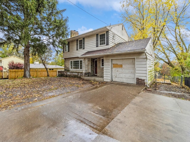 front of property with a garage